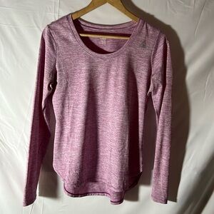 Reebok long sleeve athletic shirt size small with drop tail